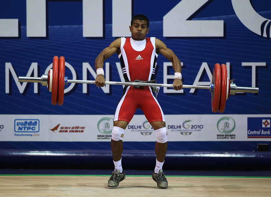 19th Commonwealth Games - Day 1: Weightlifting #11 Photograph by Daniel Berehulak