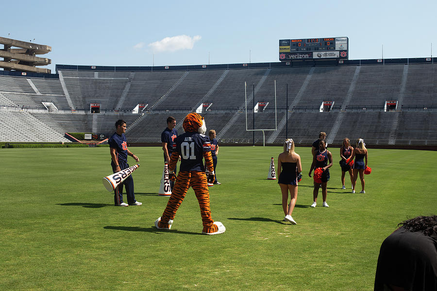 Aubie the Tiger and Auburn cheerleadrs practicing at Auburn University Photograph by Eldon McGraw