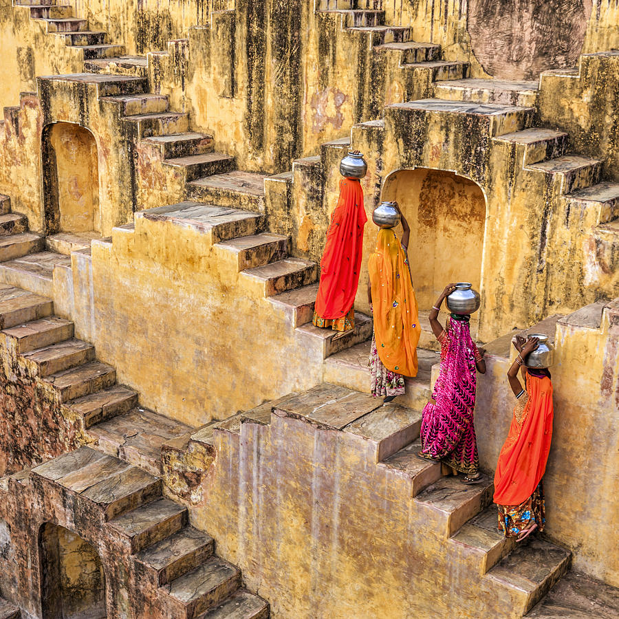Indian women carrying water from stepwell near Jaipur #11 Photograph by Hadynyah