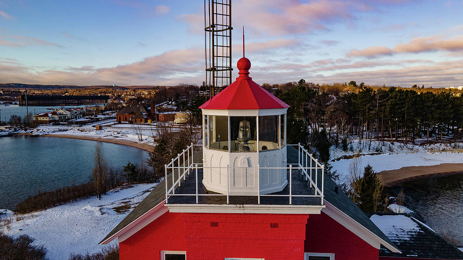 Marquette Harbor Lighthouse along Lake Superior in Marquette Michigan in the winter #11 Photograph by Eldon McGraw