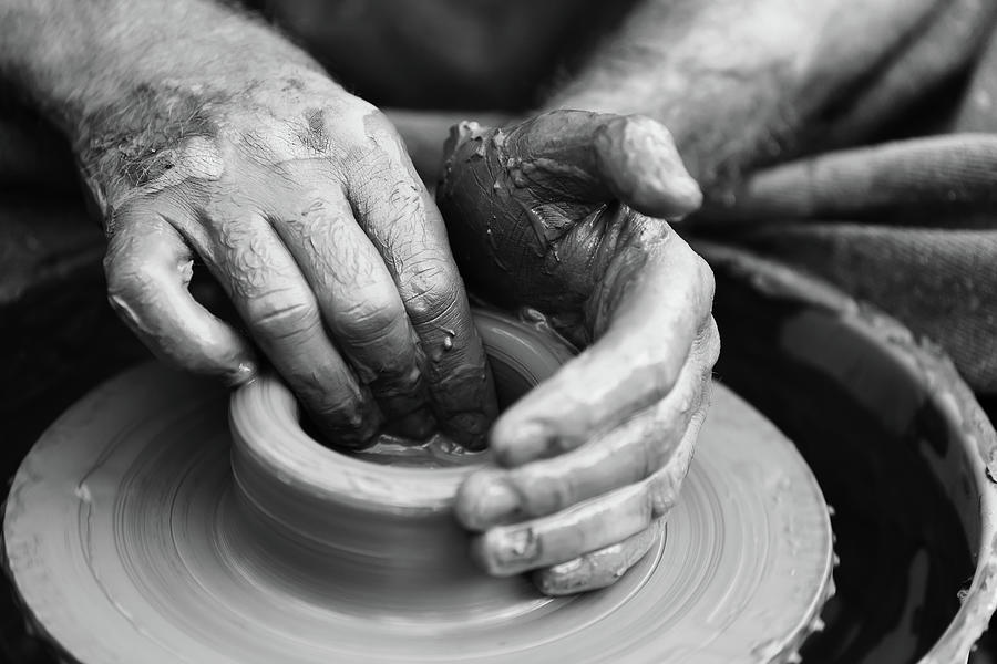 Potter making ceramic pot on the pottery wheel Photograph by Volodymyr ...