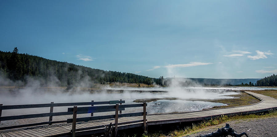 Eruption of Old Faithful geyser at Yellowstone Nationl park #12 Photograph by Alex Grichenko
