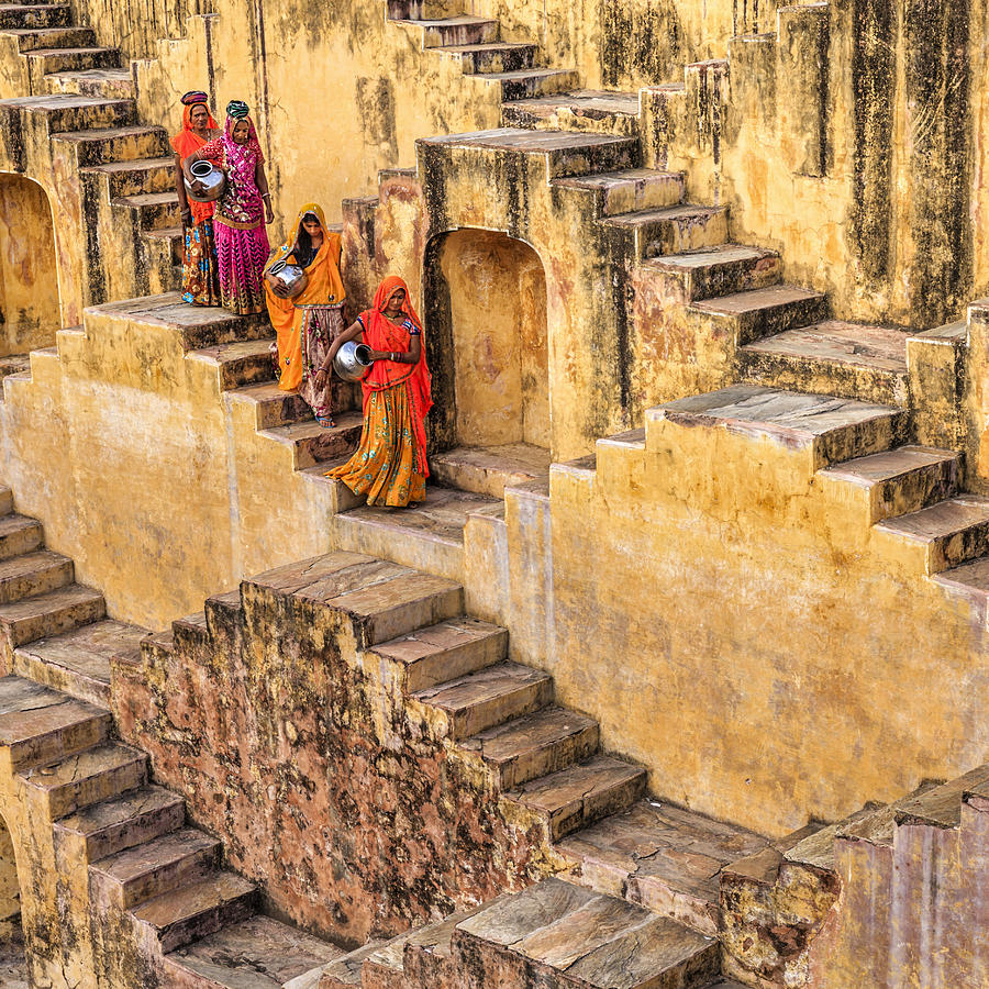 Indian women carrying water from stepwell near Jaipur #12 Photograph by Hadynyah
