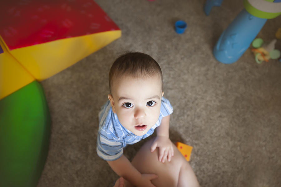 12 Month Old Baby Sits on Carpet Looking Up at Mother Photograph by Jill Lehmann Photography