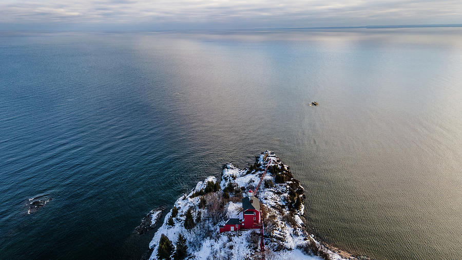 Marquette Harbor Lighthouse along Lake Superior in Marquette Michigan in the winter #13 Photograph by Eldon McGraw