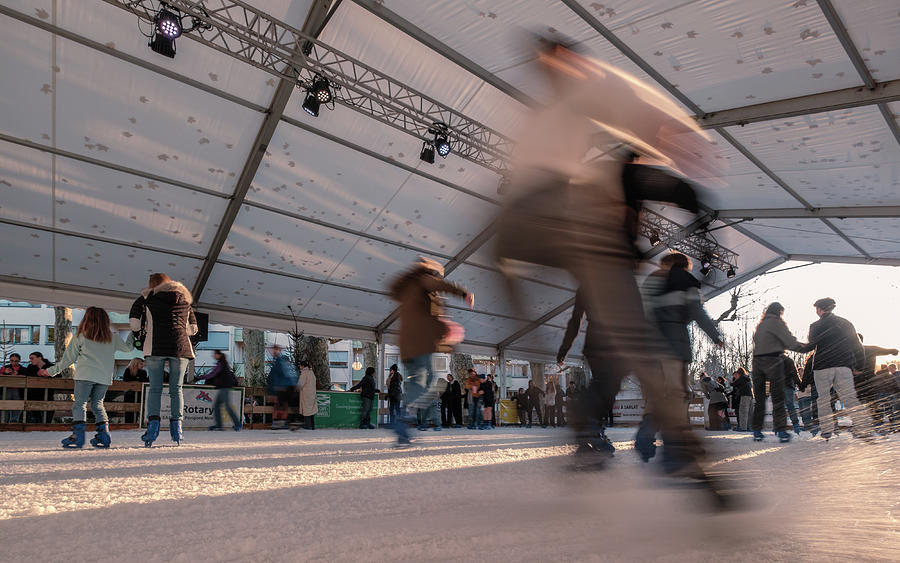 Skaters on the ice at Sarlat Christmas market #13 Photograph by Jon ...