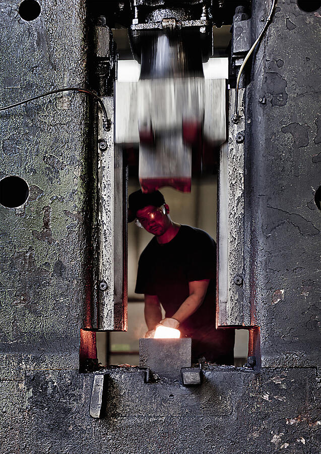 Worker in a steel factory #13 Photograph by Buena Vista Images