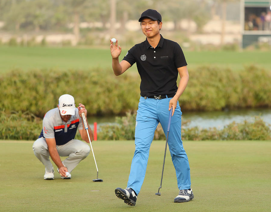 Commercial Bank Qatar Masters - Day Four #14 Photograph by Andrew Redington