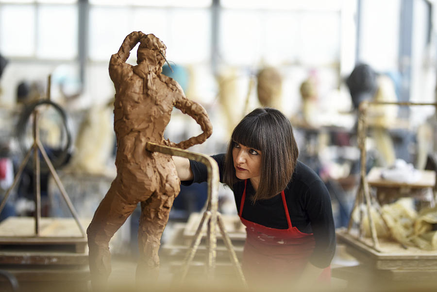Young Female Sculptor is working in her studio #14 Photograph by Baranozdemir