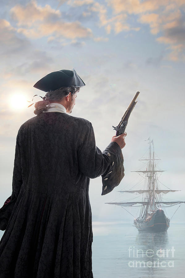 17th century Georgian pirate awaiting a Galleon sailing ship with a flintlock pistol Photograph by Lee Avison