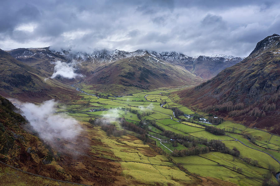 Stunning flying drone landscape image of Langdale pikes and vall ...