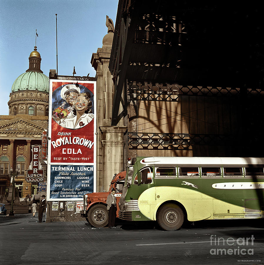 1940s city street scene Greyhound bus Photograph by Retrographs