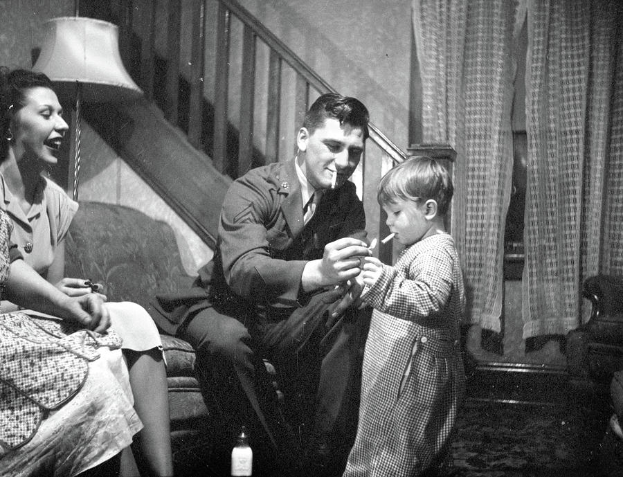1940s Dad Teaching Son to Smoke Photograph by Marilyn Hunt