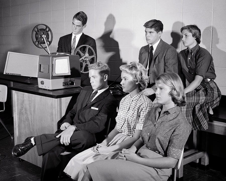 1950s High School Students Watching 16mm Educational Movie In Classroom Photograph by Panoramic Images
