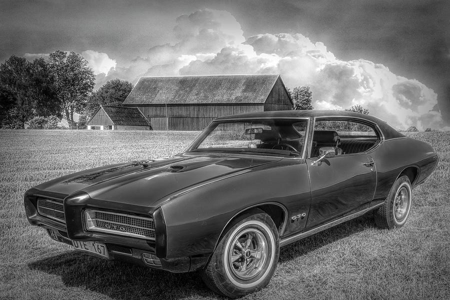 1969 Pontiac GTO in Black and White Photograph by Debra and Dave Vanderlaan