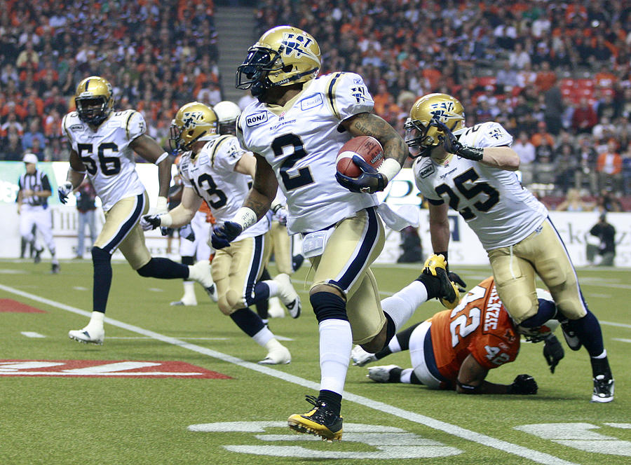 99th Grey Cup - Winnipeg Blue Bombers v BC Lions #2 Photograph by Jeff Vinnick