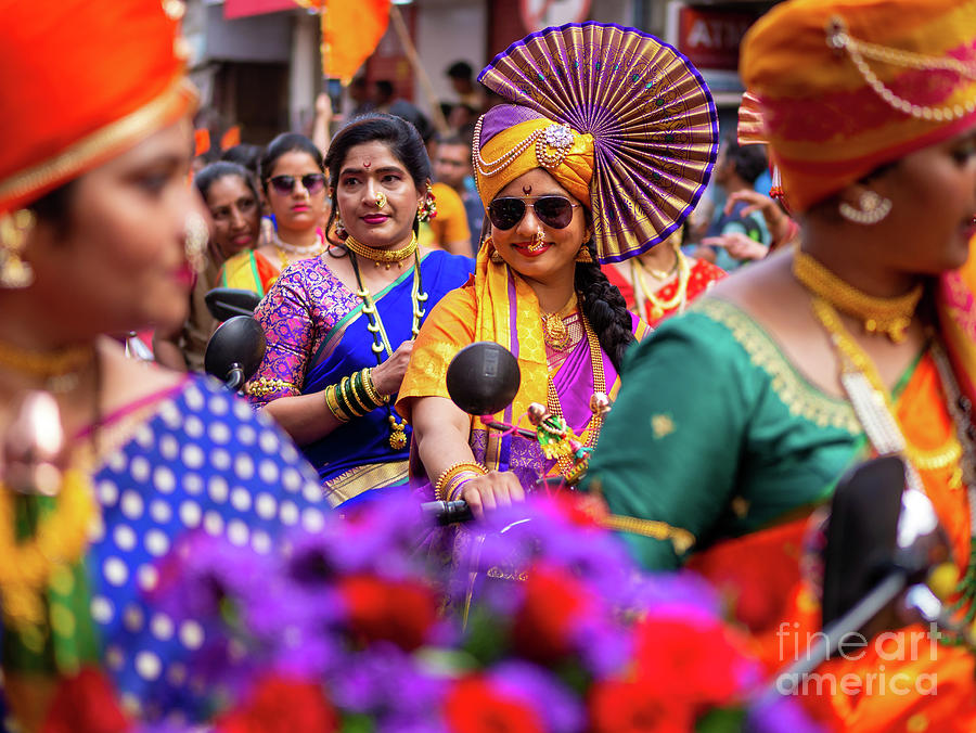 A beautiful indian female dressed in traditional attire driving ...