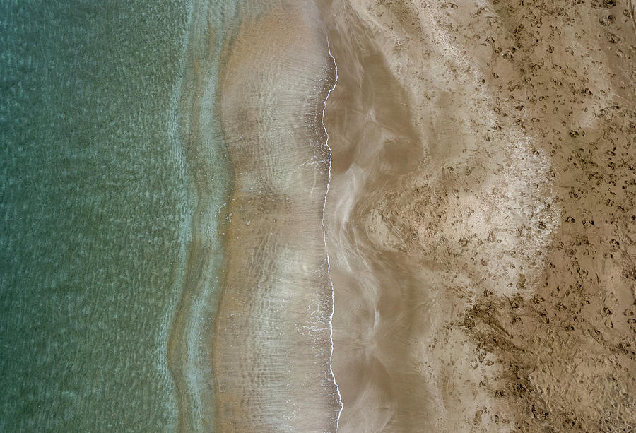 Aerial view drone of empty tropical sandy beach with golden sand. Seascape background Photograph by Michalakis Ppalis