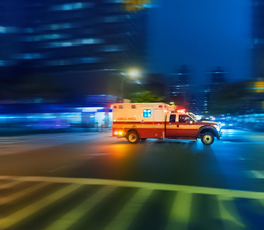 Ambulance speeding in New York #2 Photograph by Thepalmer