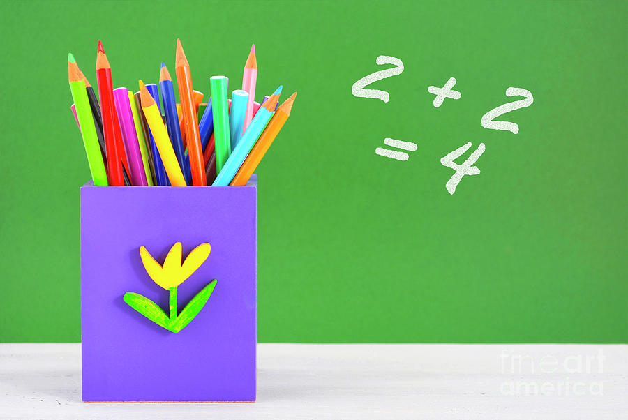 Back to school pencil box against green chalkboard. #2 Photograph by Milleflore Images
