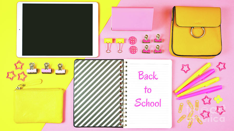 Back to school pink and yellow teens theme concept flat lay. #2 Photograph by Milleflore Images