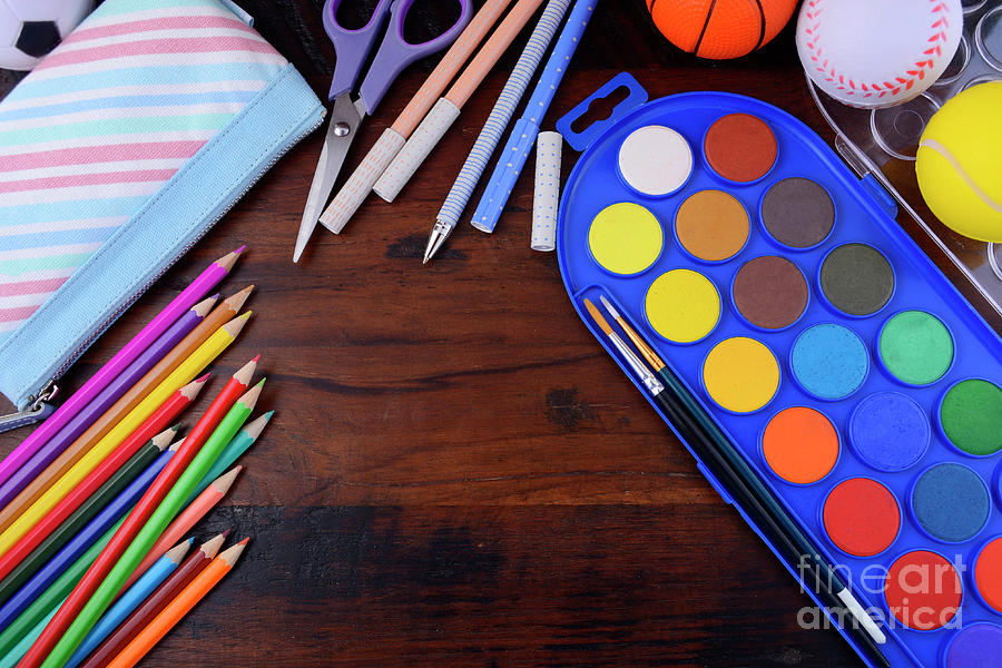 Back to School with coloring pencils paints. #2 Photograph by Milleflore Images