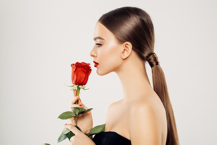 Beautiful girl with red rose #2 Photograph by CoffeeAndMilk
