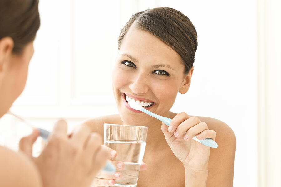 Beautiful woman brushing her teeth #2 Photograph by Eva-Katalin
