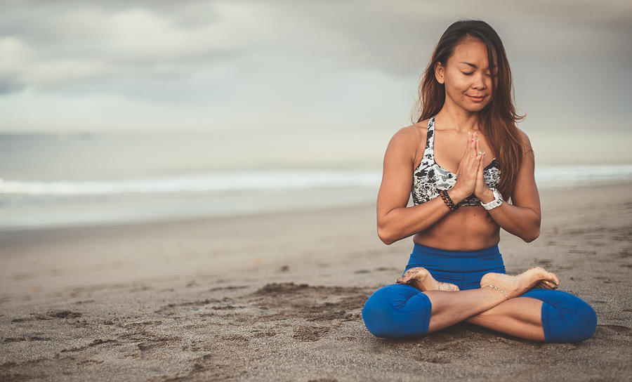 Beautiful Woman Doing Yoga Meditation Exercises #2 Photograph by South_agency