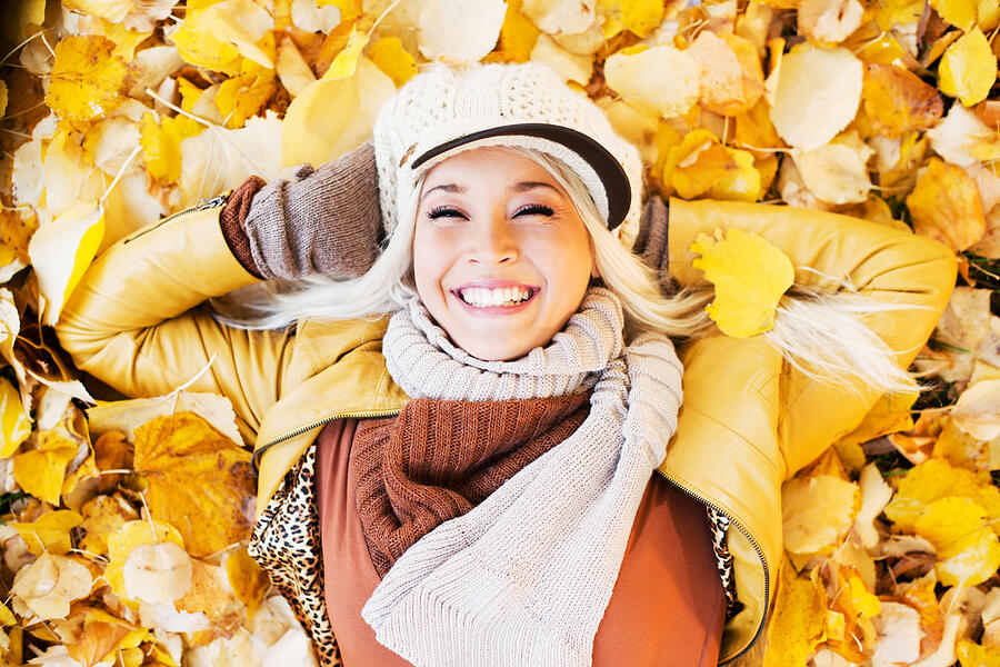 Beautiful woman enjoying in a sunny autumn day #2 Photograph by Skynesher