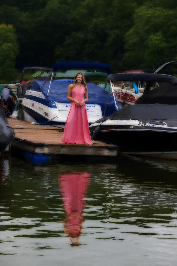 Beautiful woman in pink dress at a marina on a dock #2 Photograph by Dan Friend