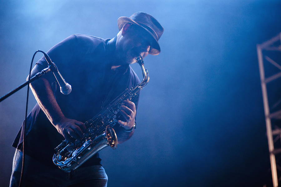 Black musician playing saxophone on stage #2 Photograph by Jon Feingersh Photography Inc