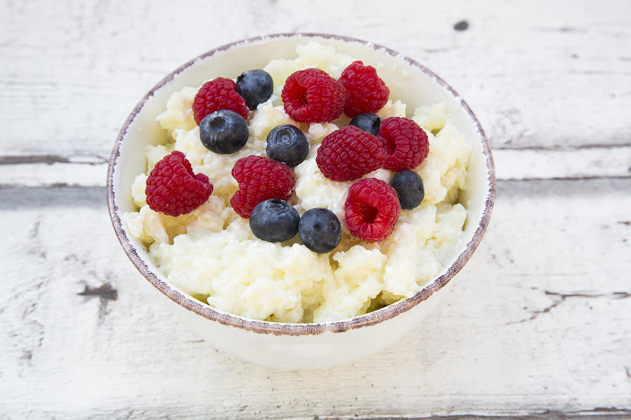 Bowl of Rice Pudding with Berries #2 Photograph by Larissa Veronesi