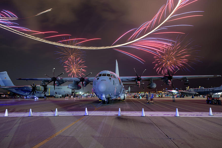 Airplane Photograph - C130 with fireworks #2 by Keith Homan
