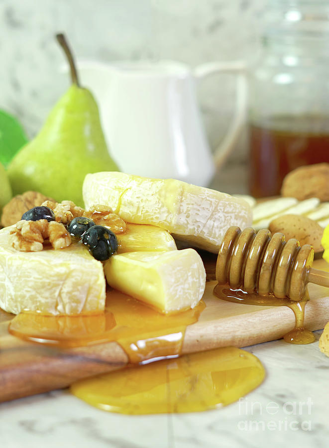 Camembert and brie cheese with honey, fruit and nuts. #2 Photograph by Milleflore Images
