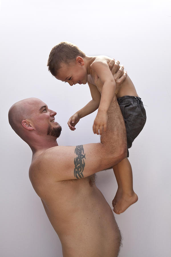 Caucasian father holding son #2 Photograph by Kyle Monk