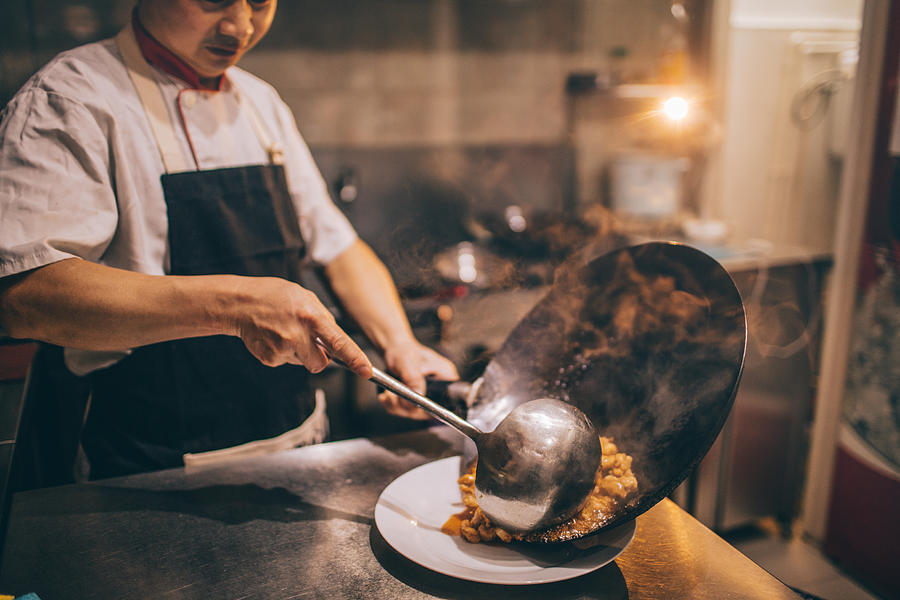 Chef preparing food in Chinese restaurant #2 Photograph by AleksandarNakic