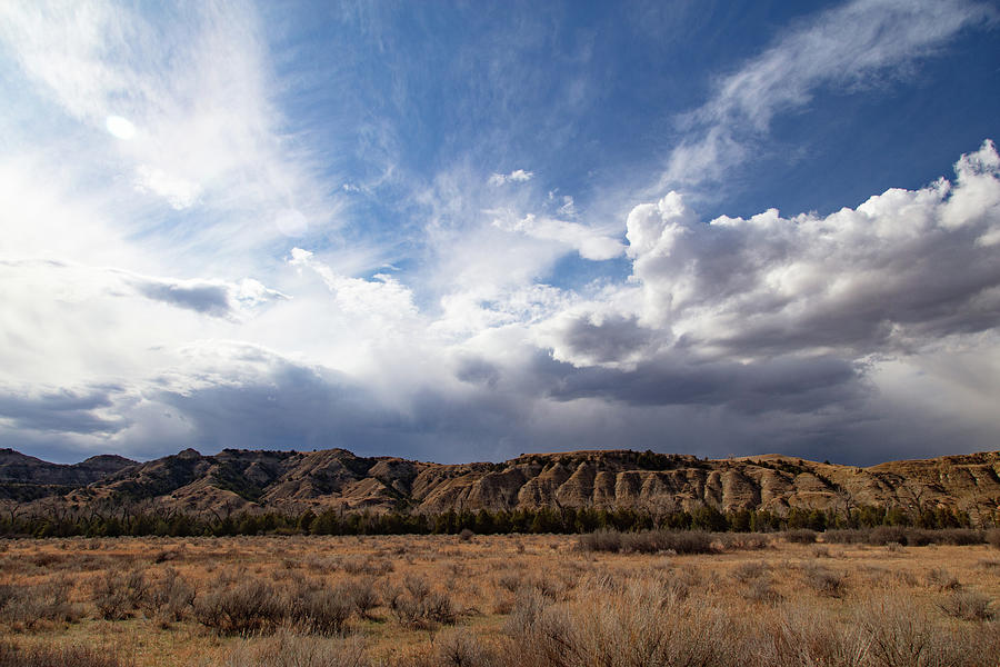 Clouds over Theodore Roosevelt National Park in North Dakota #2 Photograph by Eldon McGraw