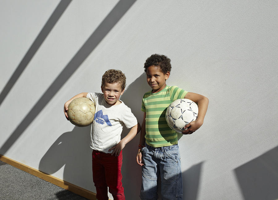 2 Cool Boys Smiling With Their Soccer Balls Photograph by Klaus Vedfelt