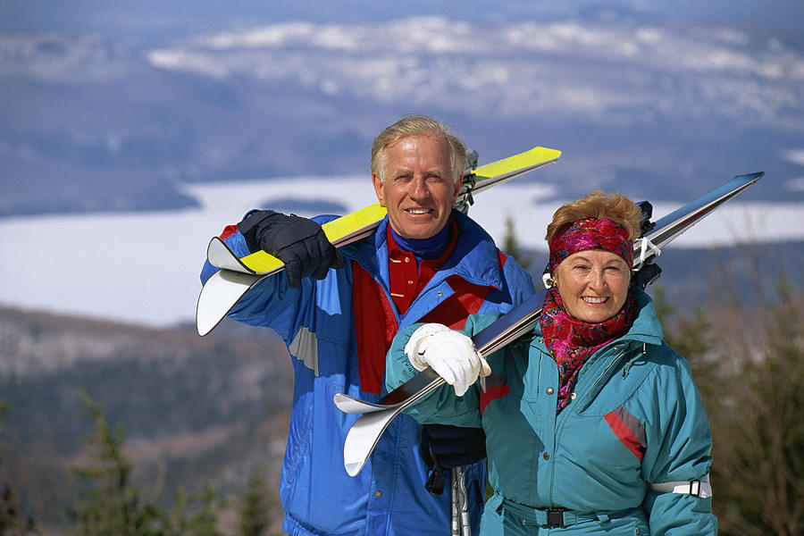 Couple skiing #2 Photograph by Comstock Images