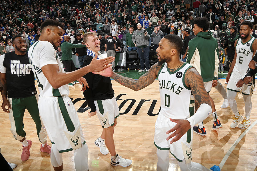 Damian Lillard and Giannis Antetokounmpo #2 Photograph by Gary Dineen