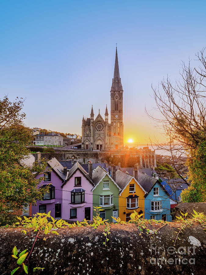 Deck of Cards colourful houses and St. Colman's Cathedral at sunrise in ...