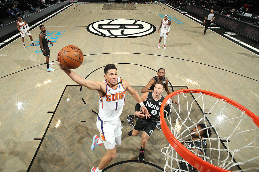Devin Booker Photograph by Nathaniel S. Butler Devin Booker Photograph by Nathaniel S. Butler