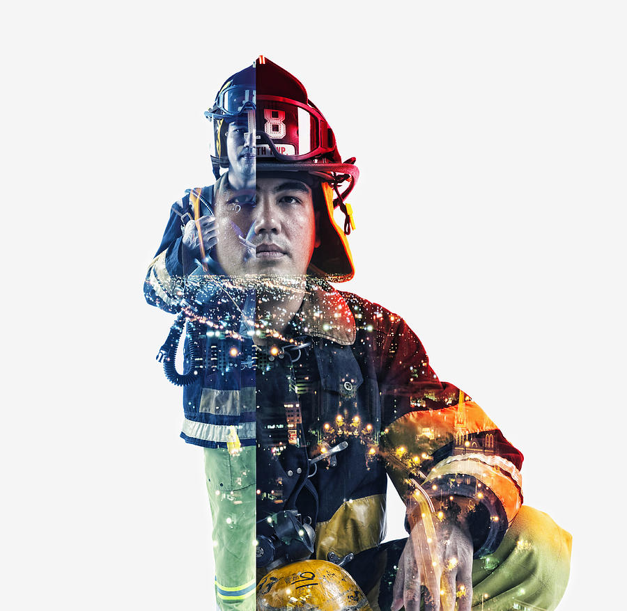 Double exposure of cityscape and fire fighter #2 Photograph by Colin Anderson Productions pty ltd