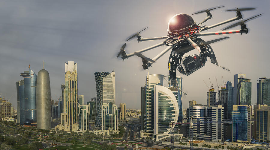 Drone flying over a futuristic city #2 Photograph by Buena Vista Images