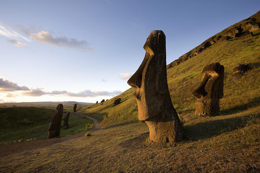 Easter Island, Rano Raraka, ancient Moai statues on hillside #2 Photograph by Michael Dunning