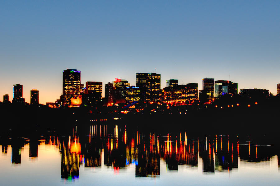 Edmonton skyline at sunset reflected in river #2 Photograph by Wildroze