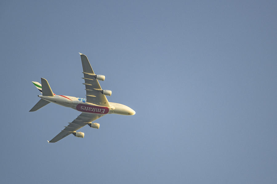 Emirates Airline Airbus A380 flying high up in the air. #2 Photograph by Sjo