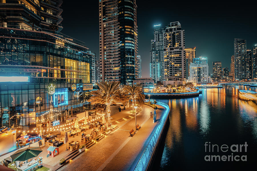 Fantastic nighttime skyline with illuminated skyscrapers. Dubai, UAE #2 Photograph by Raimond Klavins