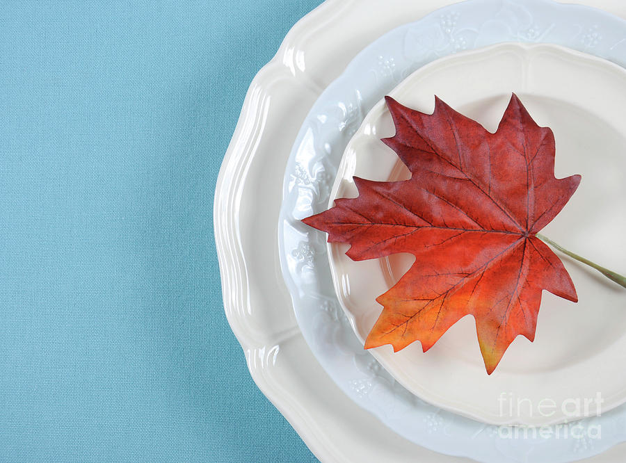 Festive holiday table place setting with maple leaf on fine china close up. #2 Photograph by Milleflore Images